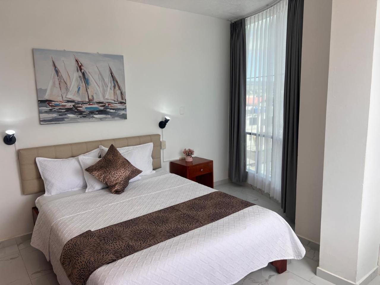 Hostal Carliza ปูแอร์โตอาโยรา ภายนอก รูปภาพ