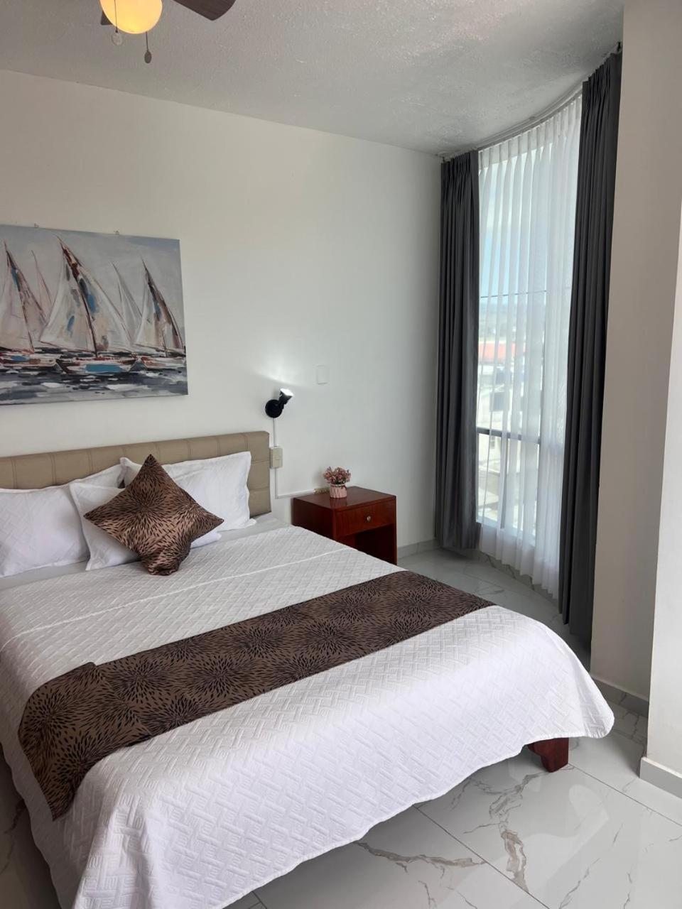 Hostal Carliza ปูแอร์โตอาโยรา ภายนอก รูปภาพ