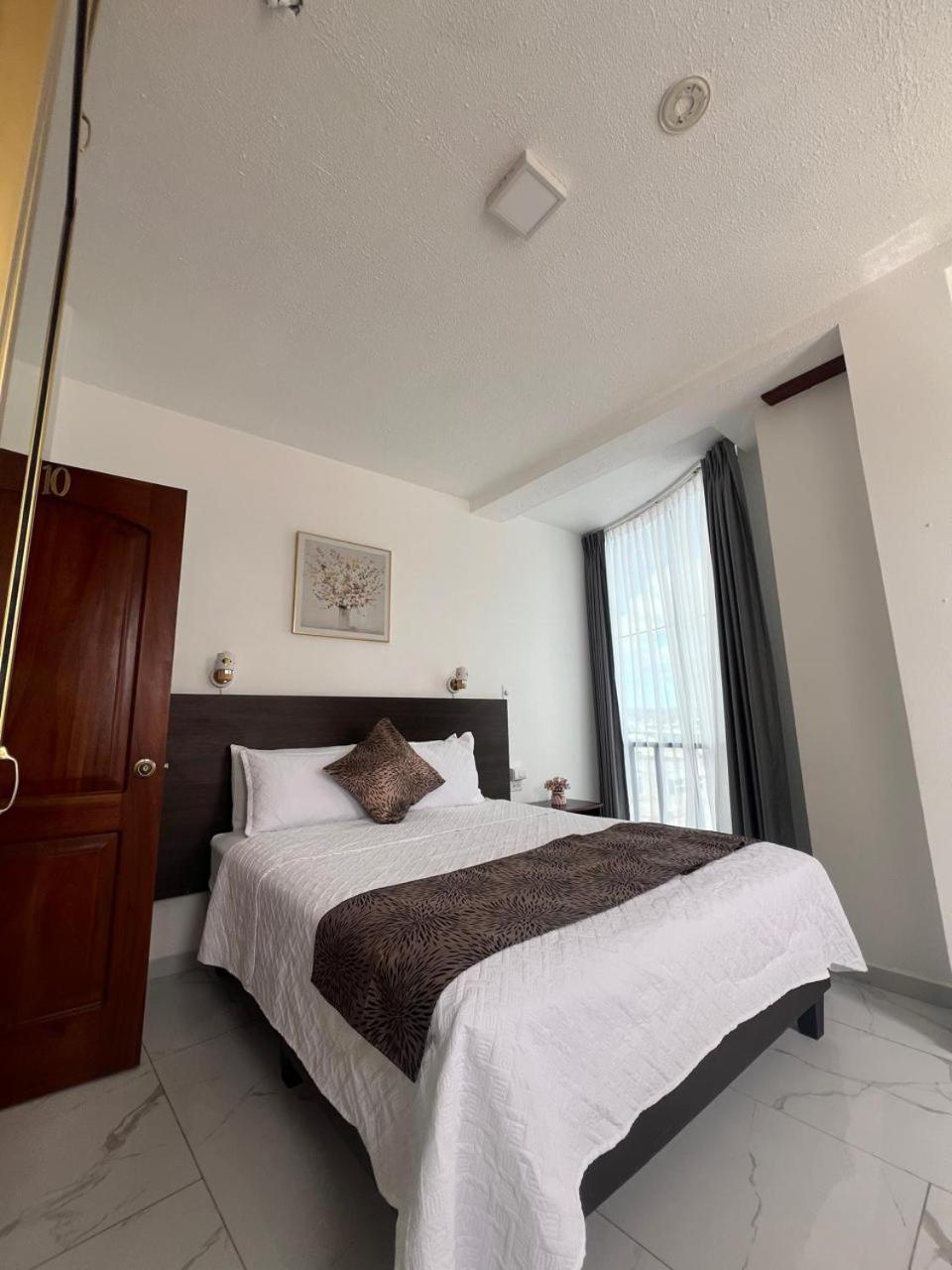 Hostal Carliza ปูแอร์โตอาโยรา ภายนอก รูปภาพ