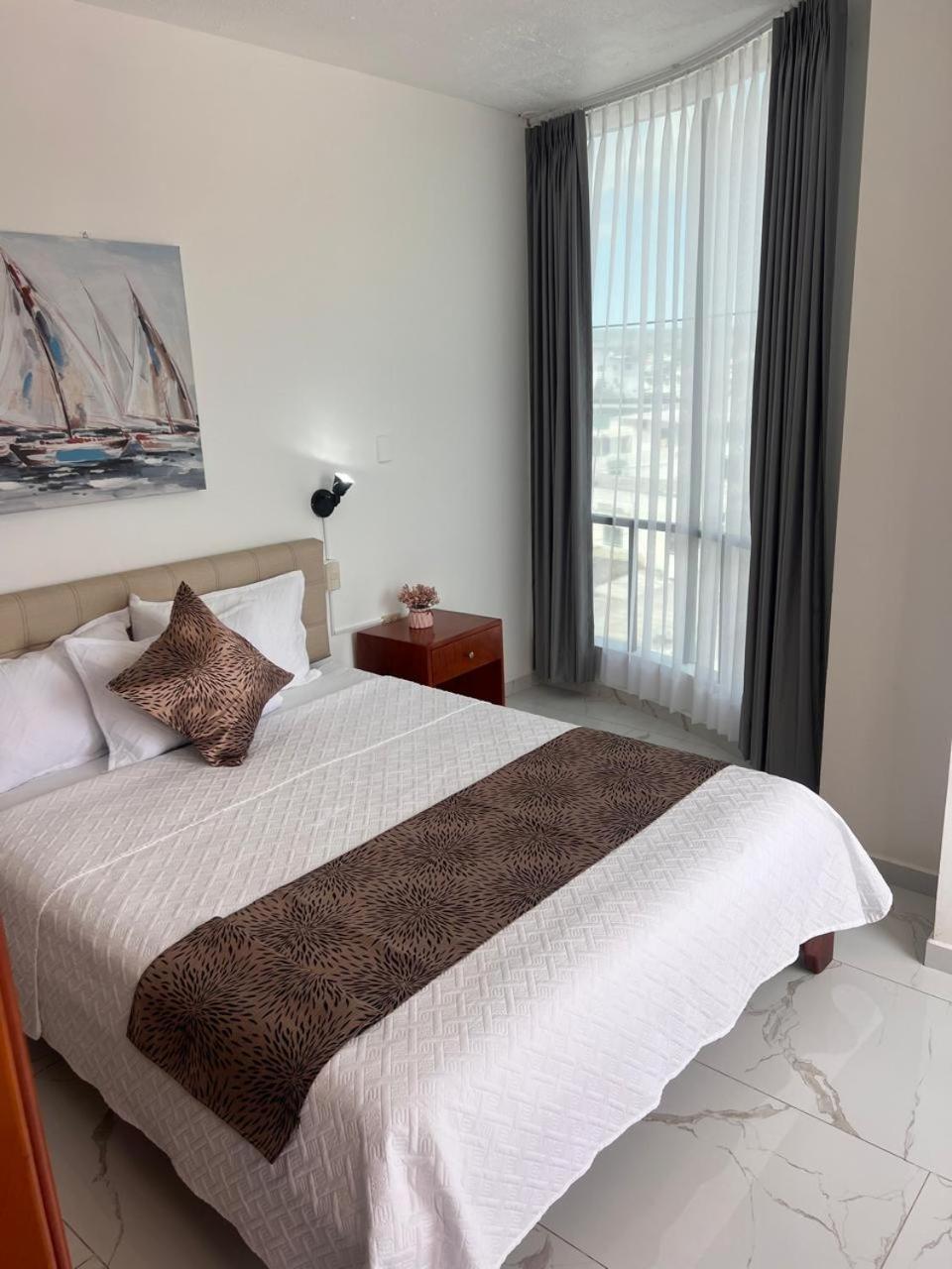 Hostal Carliza ปูแอร์โตอาโยรา ภายนอก รูปภาพ