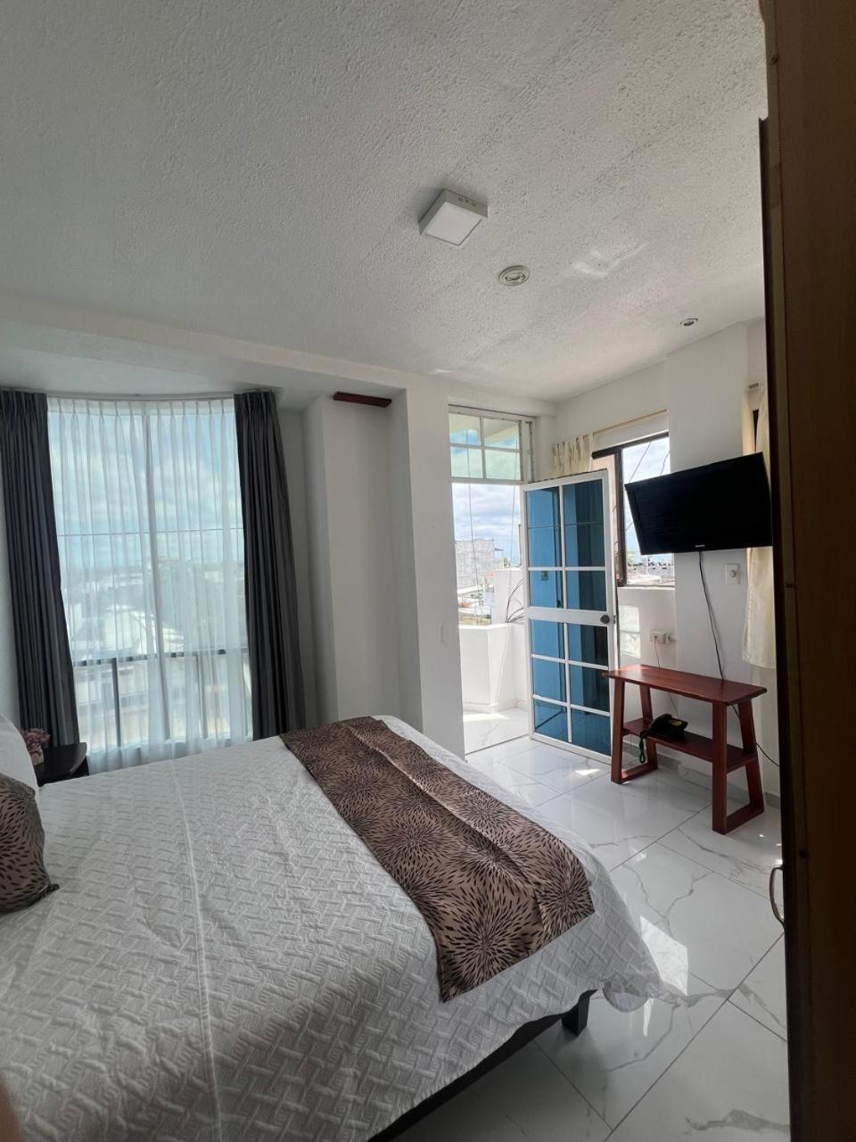 Hostal Carliza ปูแอร์โตอาโยรา ภายนอก รูปภาพ